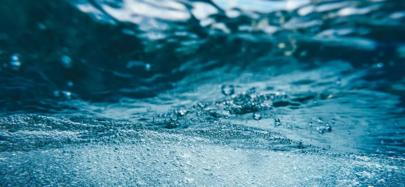 Underwater splash with bubbles.