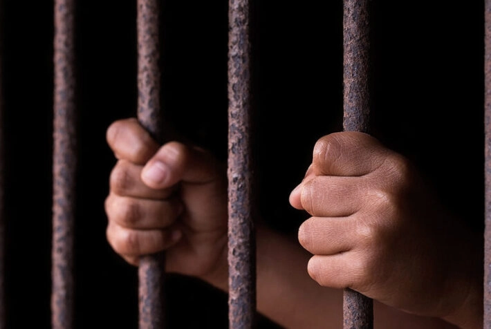 Boy hold cage with eye sad and hopeless