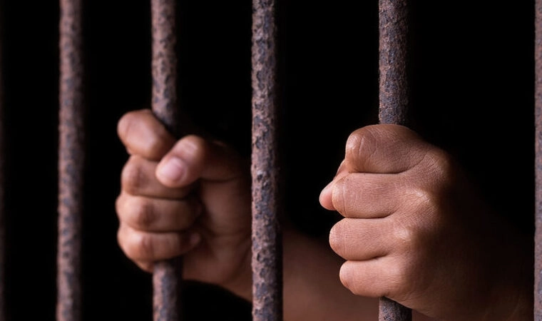 Boy hold cage with eye sad and hopeless