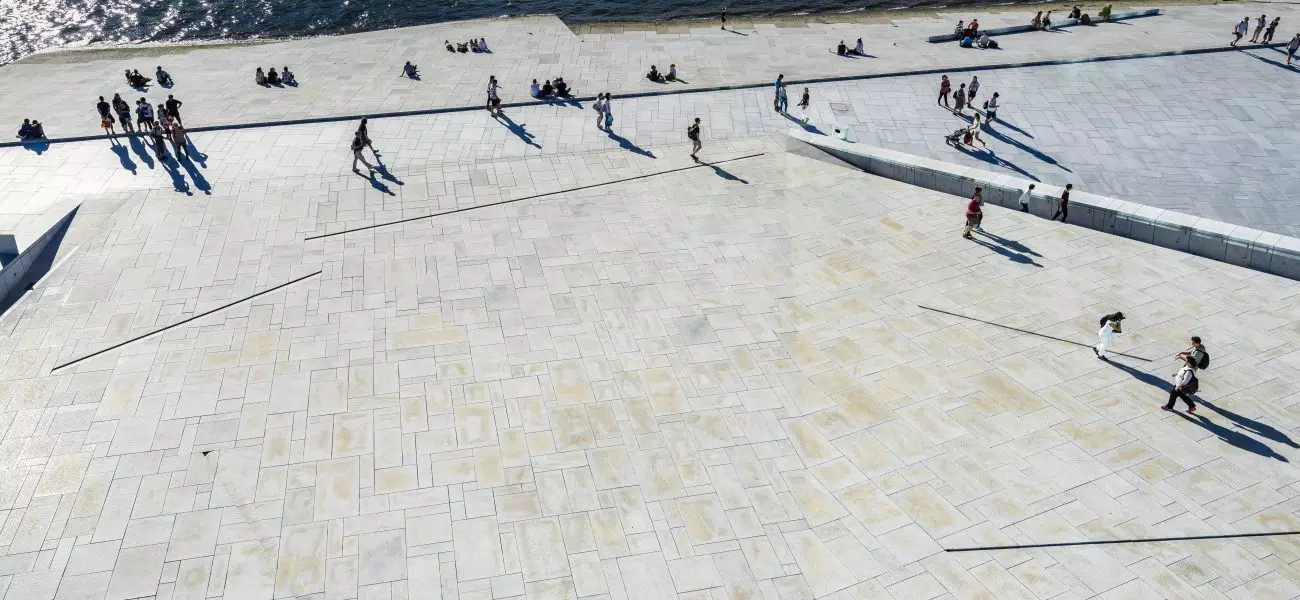 Aerial view of people enjoying a summer day at Oslo Opera House. Oslo, Norway, August 2018